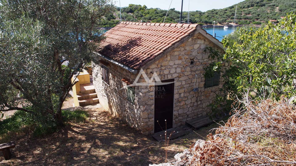 MALA RAVA - CHARMING STONE HOUSE FOR SALE IN THE FIRST ROW TO THE SEA